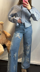 Jeans con ricamo